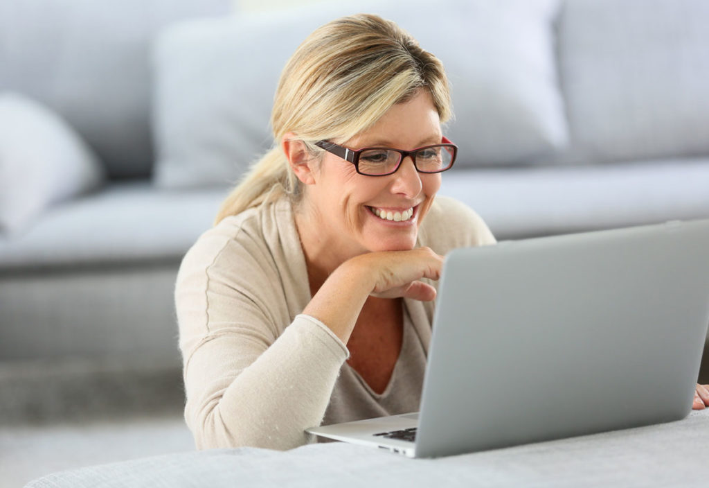 happy on the laptop