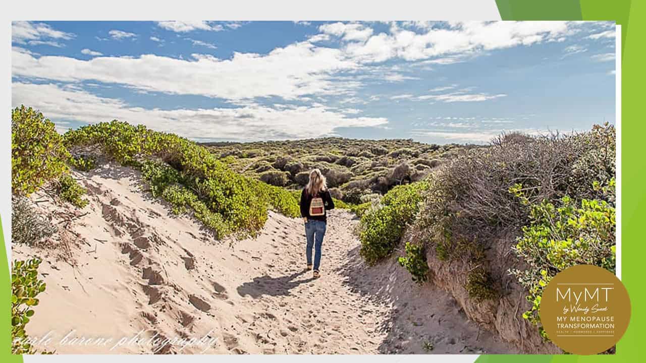 Bridget Walking in Sand dunes