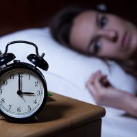 Alarm clock showing 3 a.m. Alarm clock showing 3 a.m.